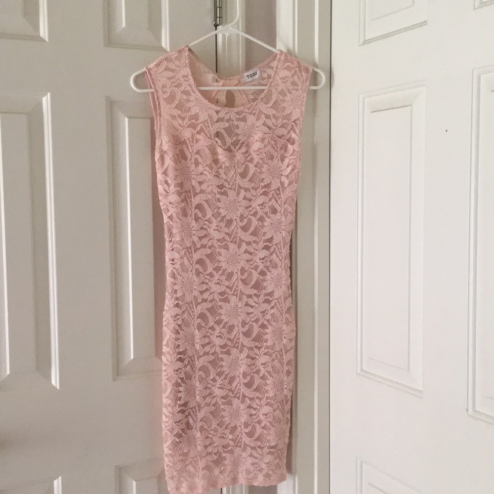Pink lacy dress. Low cut back